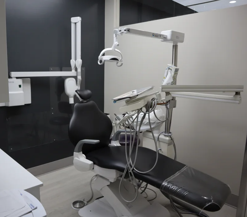 Thornhill dentist providing dental care to middle aged man in dentists chair