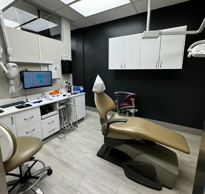 Thornhill dentist providing dental care to middle aged man in dentists chair