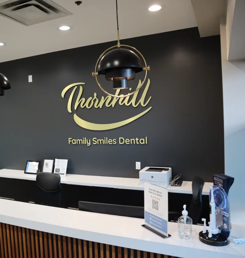 Thornhill dentist providing dental care to middle aged man in dentists chair